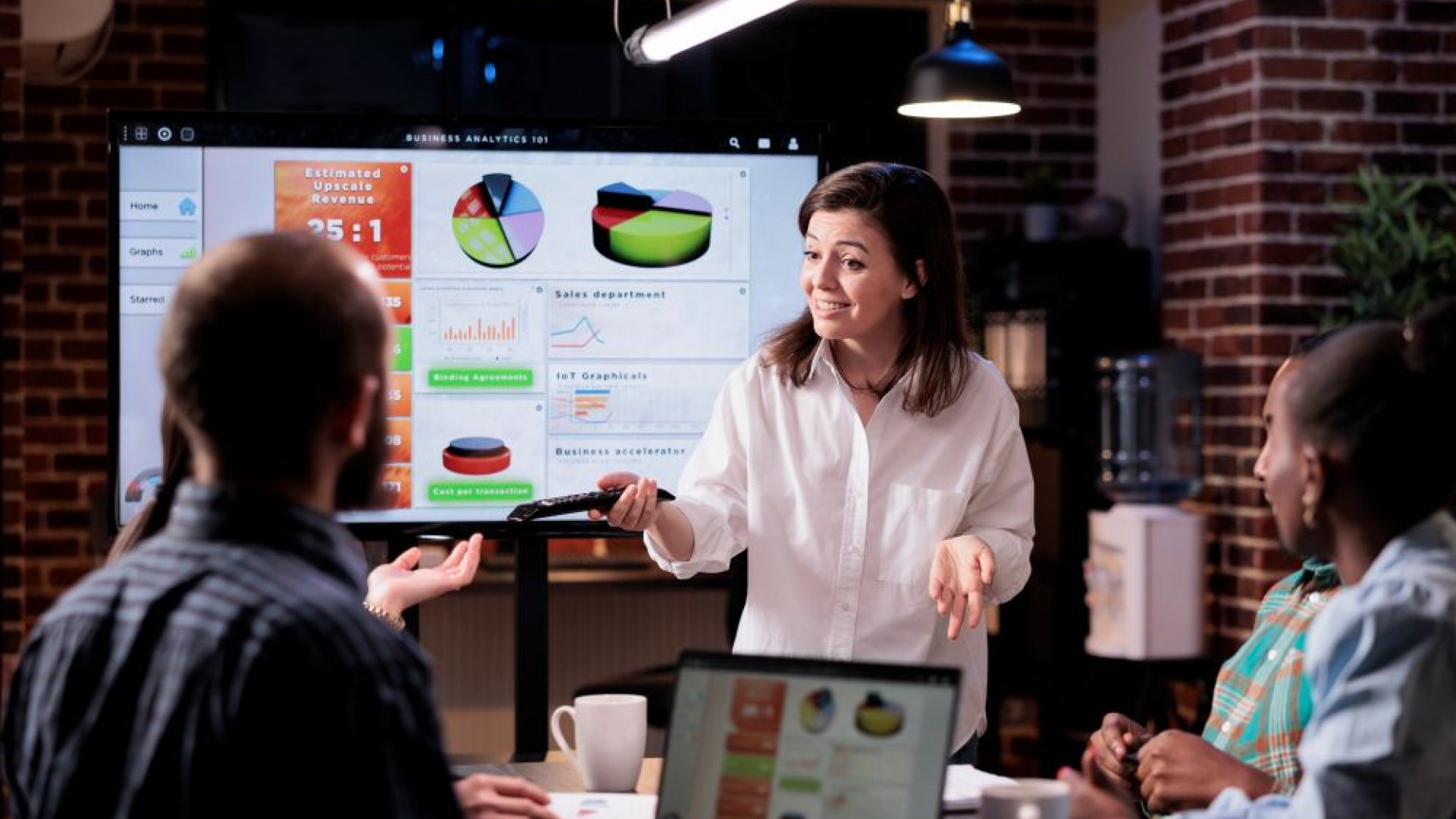 smiling-caucasian-woman-in-startup-office-doing-bu-2025-02-17-08-26-14-utc smiling-caucasian-woman-in-startup-office-doing-bu-2025-02-17-08-26-14-utc