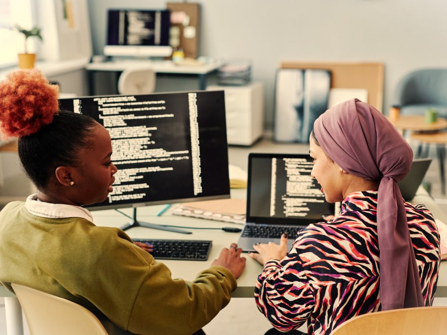 back-view-at-two-female-programmers-writing-code-t-2025-03-07-20-15-24-utc