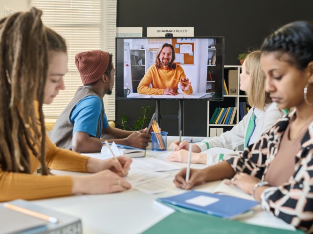 teacher-teaching-his-students-online-2023-11-27-05-18-04-utc teacher-teaching-his-students-online-2023-11-27-05-18-04-utc