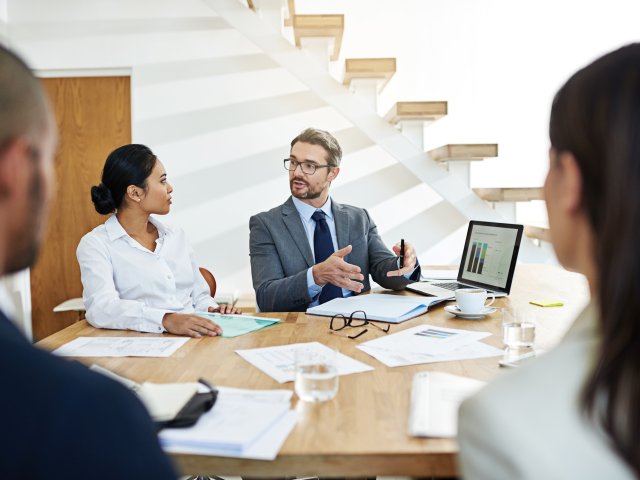 Tech team discussing a project Tech team discussing a project