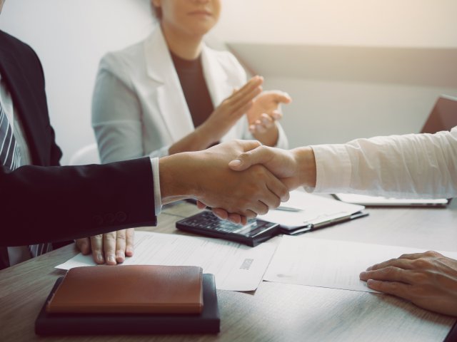 manager-and-employee-interview-concept-with-handsh-2024-12-02-21-23-10-utc manager-and-employee-interview-concept-with-handsh-2024-12-02-21-23-10-utc