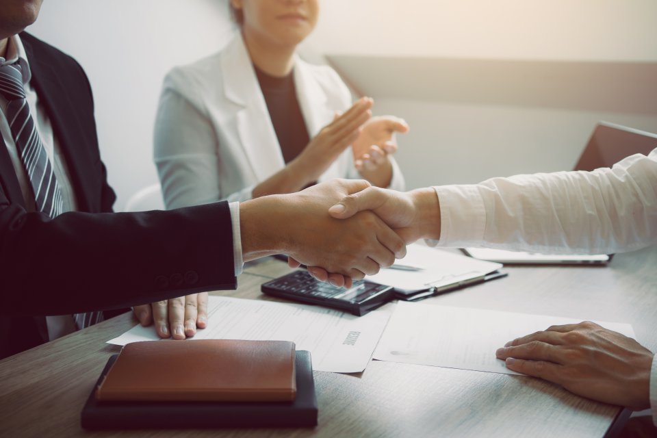 manager-and-employee-interview-concept-with-handsh-2024-12-02-21-23-10-utc manager-and-employee-interview-concept-with-handsh-2024-12-02-21-23-10-utc